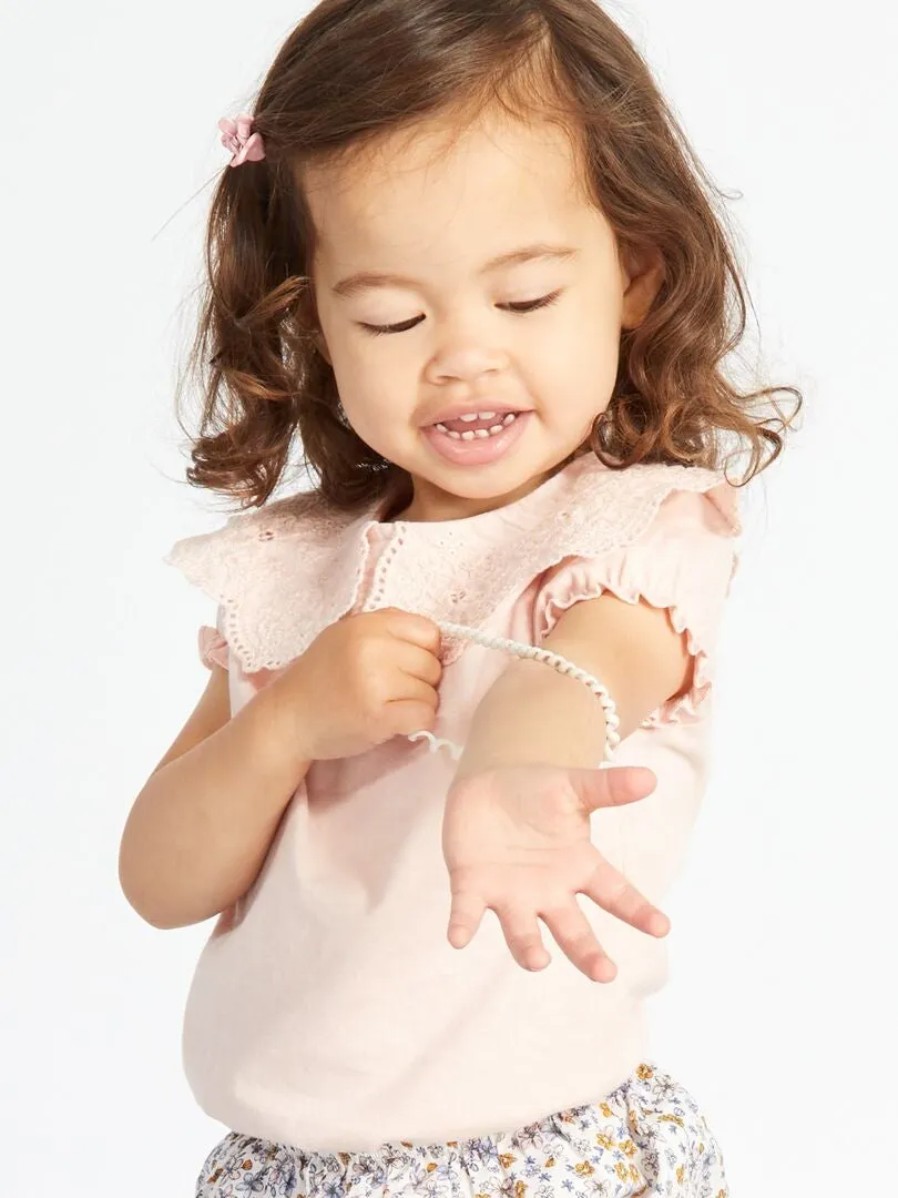 CAMISETA CON CUELLO BEBé  ROSA