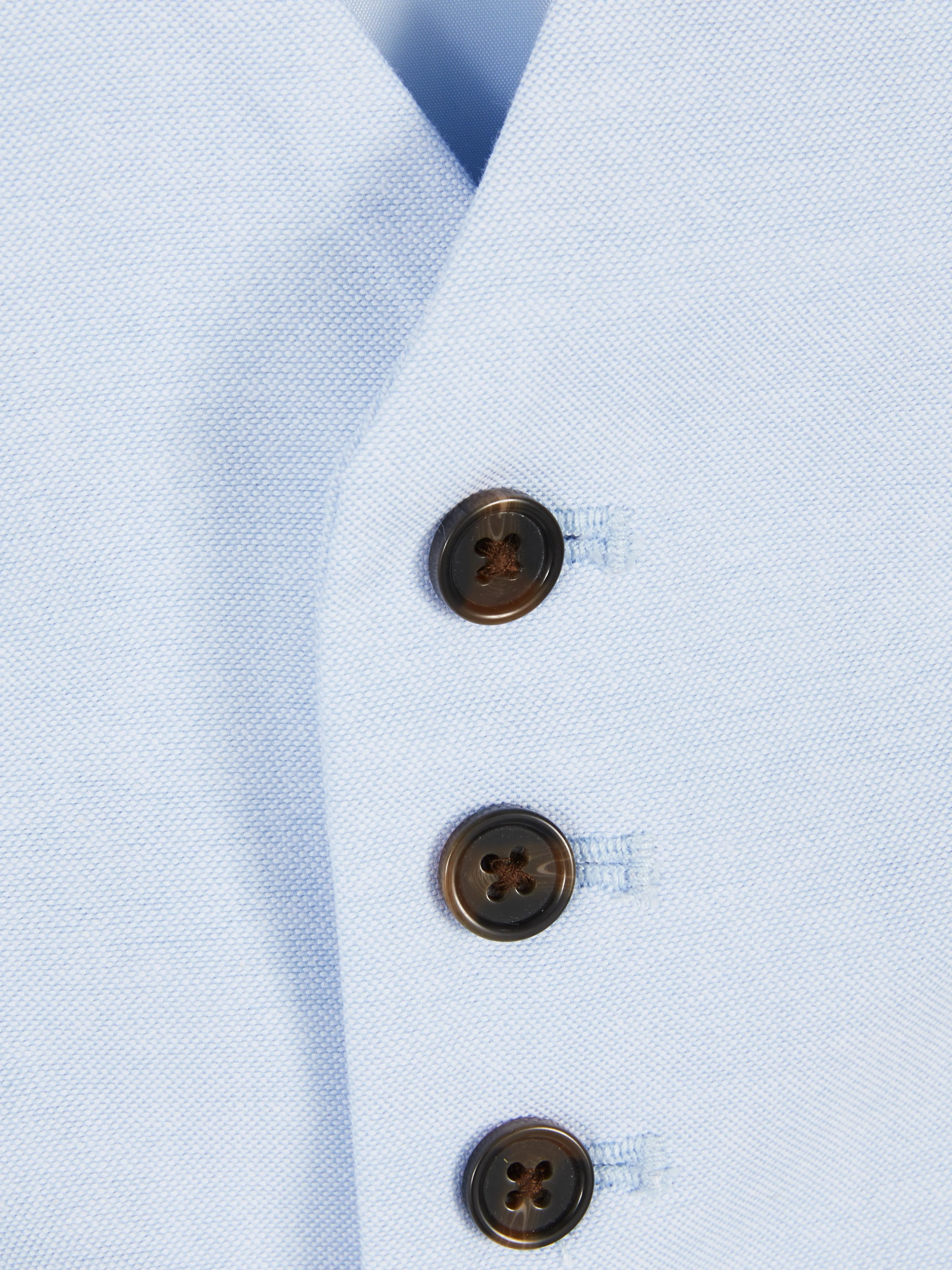 Chaleco con botones texturizado formal